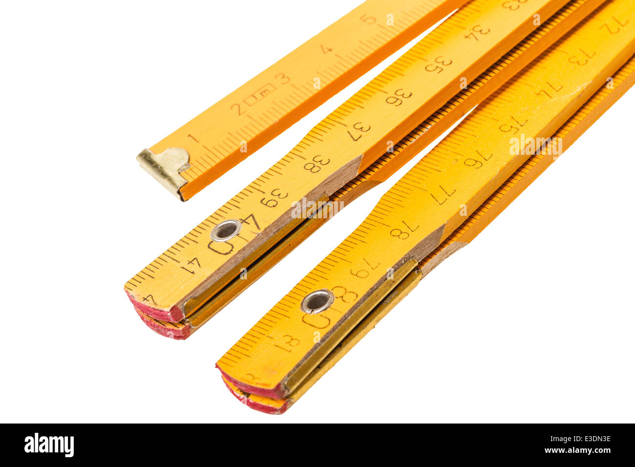 Folding ruler isolated on white Stock Photo - Alamy