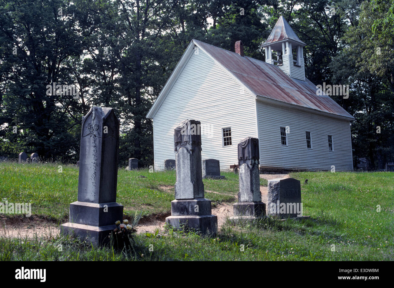 The 1887 Primitive Baptist Church and its old graveyard are now part of Great Smoky Mountain National Park in scenic Cades Cove, Tennessee, USA. Stock Photo