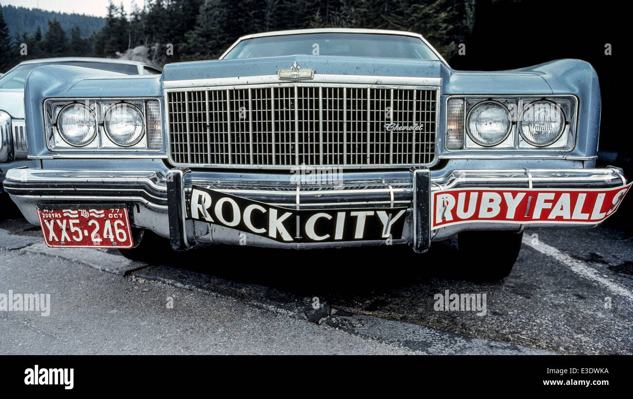 An automobile bumper carries wired-on advertisements for Rock City and Ruby Falls, two of the most publicized tourist attractions in Tennessee, USA. Stock Photo