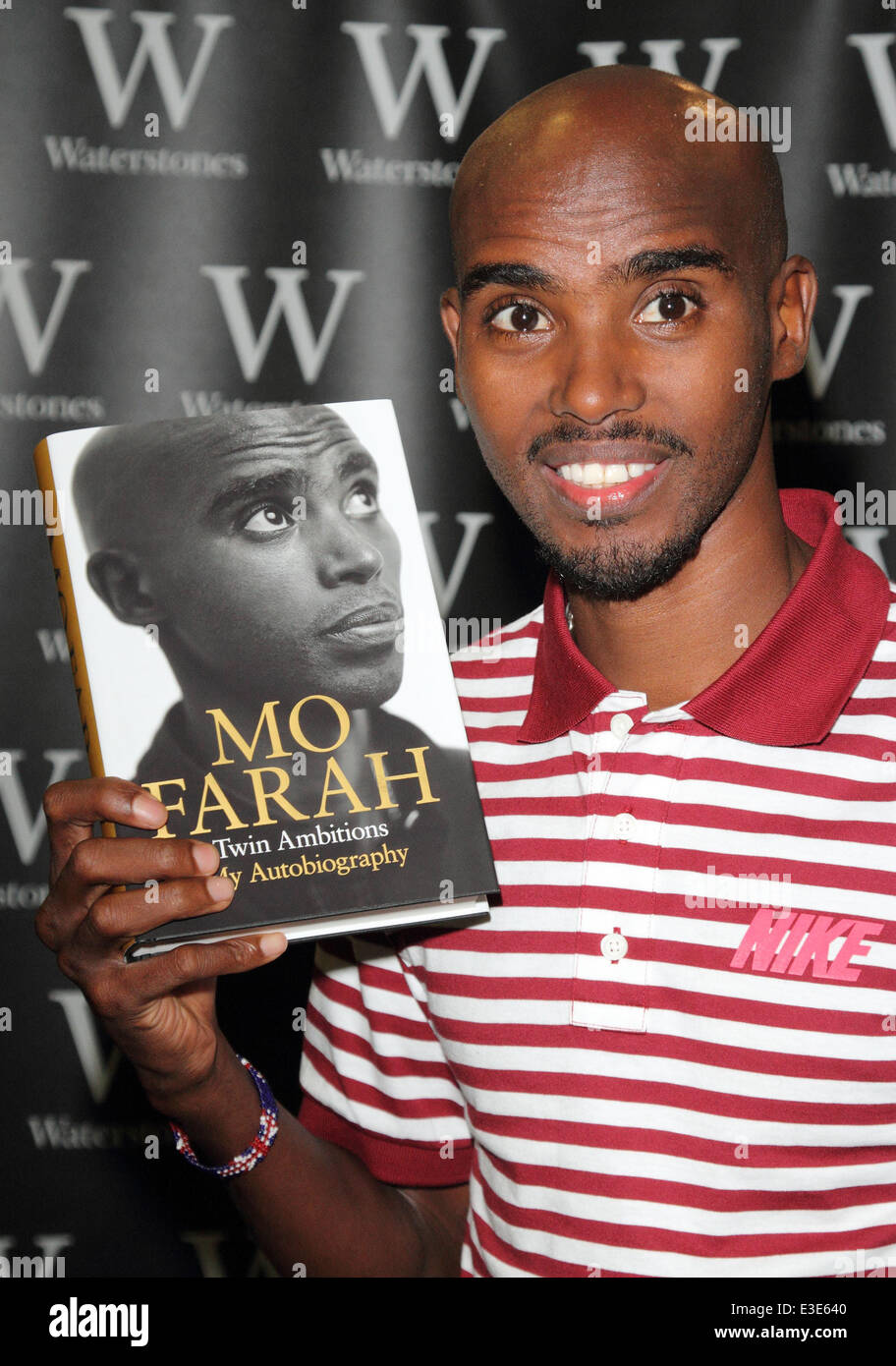 Mo farah signing his autobiography hi-res stock photography and images ...