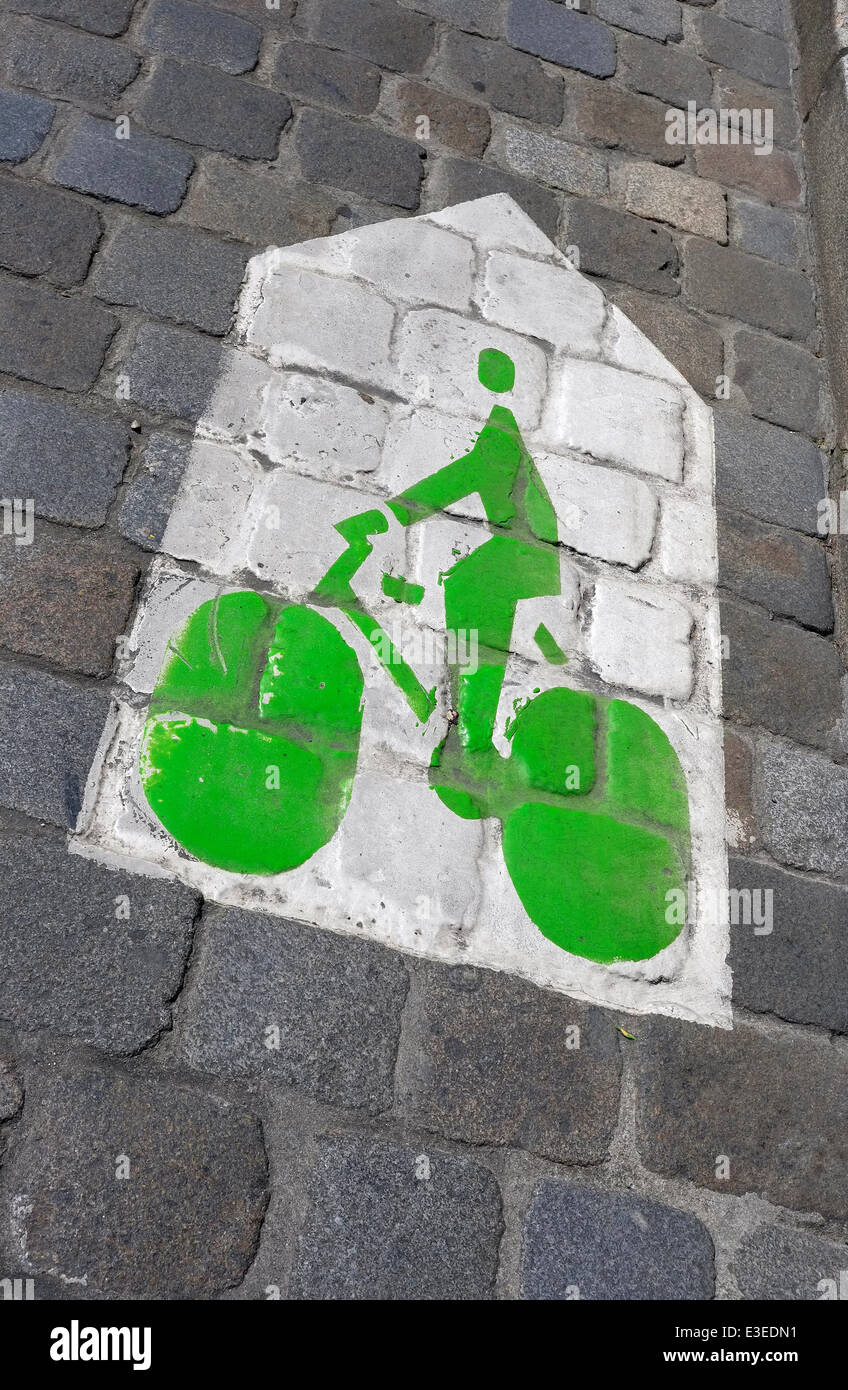 green cycle lane on cobbled street, rennes, brittany, france Stock Photo
