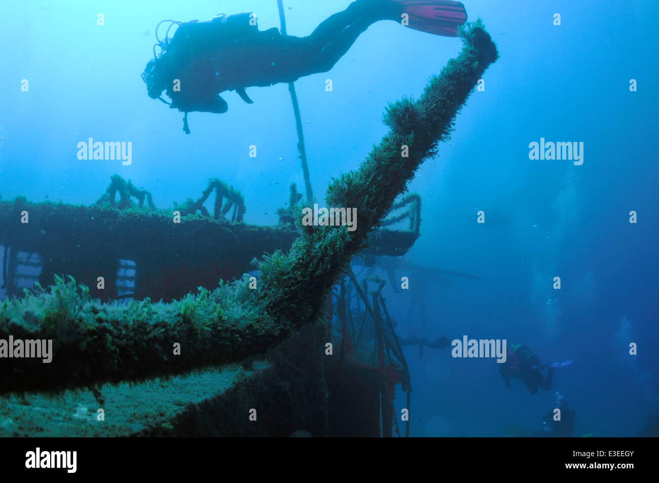 Scuba divers underwater on the El Meridian wreck south Tenerife, Canary Islands Stock Photo