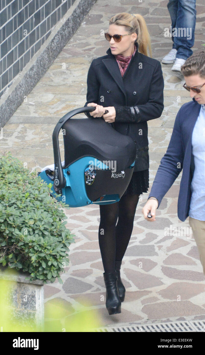 Michelle Hunziker leaving the hospital with her daughter Sole Featuring