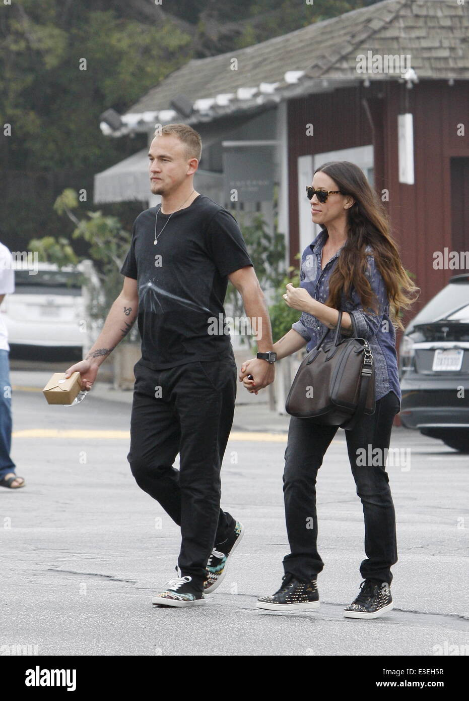 Alanis Morissette and her husband Mario Treadway out and about in