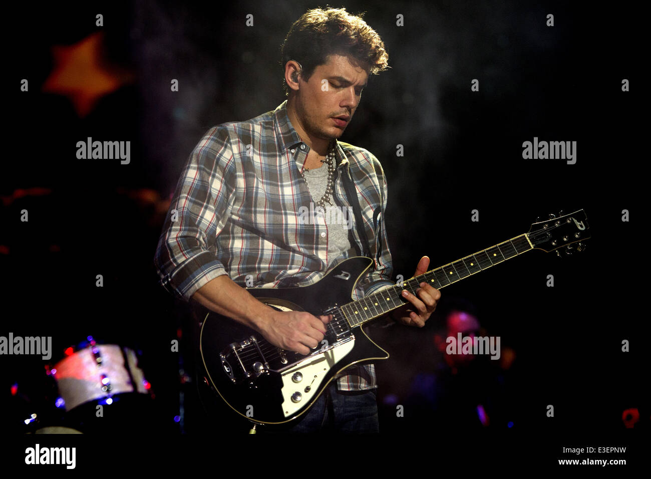 John Mayer performing live in concert on his 