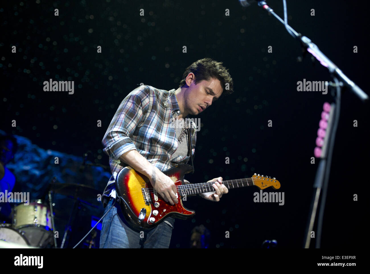 John Mayer performing live in concert on his 