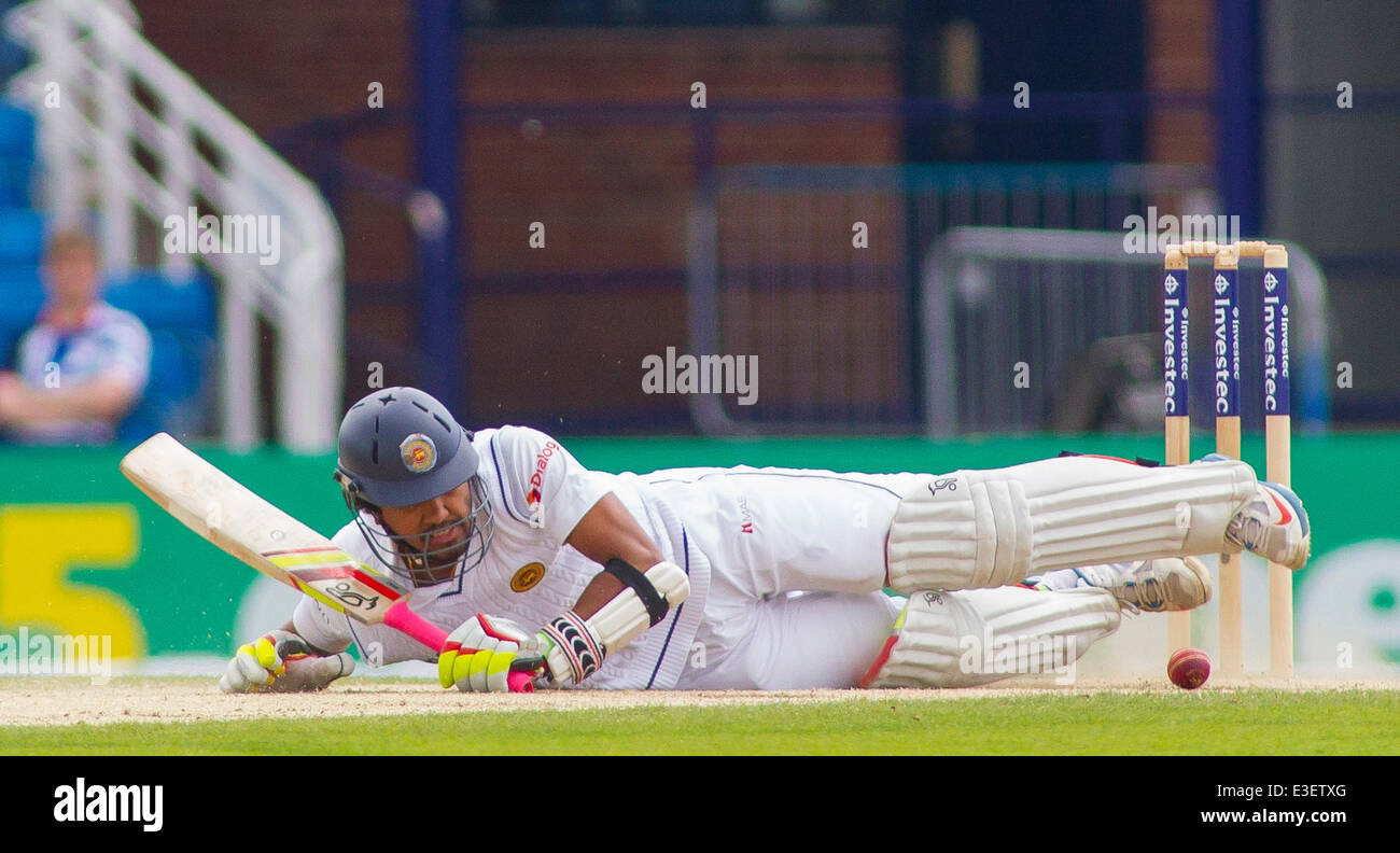 Leeds, UK. 23rd June, 2014. Dinesh Chandimal of Sri Lanka falls over whilst batting during the 2nd Investec Test Match day four between England and Sri Lanka at Headingley Cricket Ground, on June 23, 2014 in Leeds, England. Credit:  Mitchell Gunn/ESPA/Alamy Live News Stock Photo