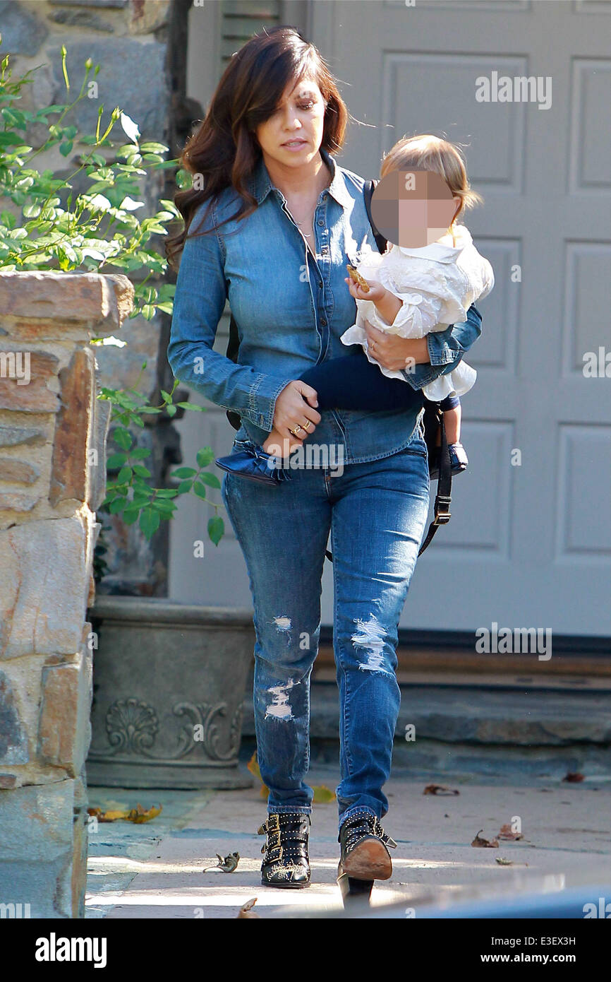 Kourtney Kardashian wearing double denim, takes her baby daughter, Penelope  Disick to First Class in Beverly