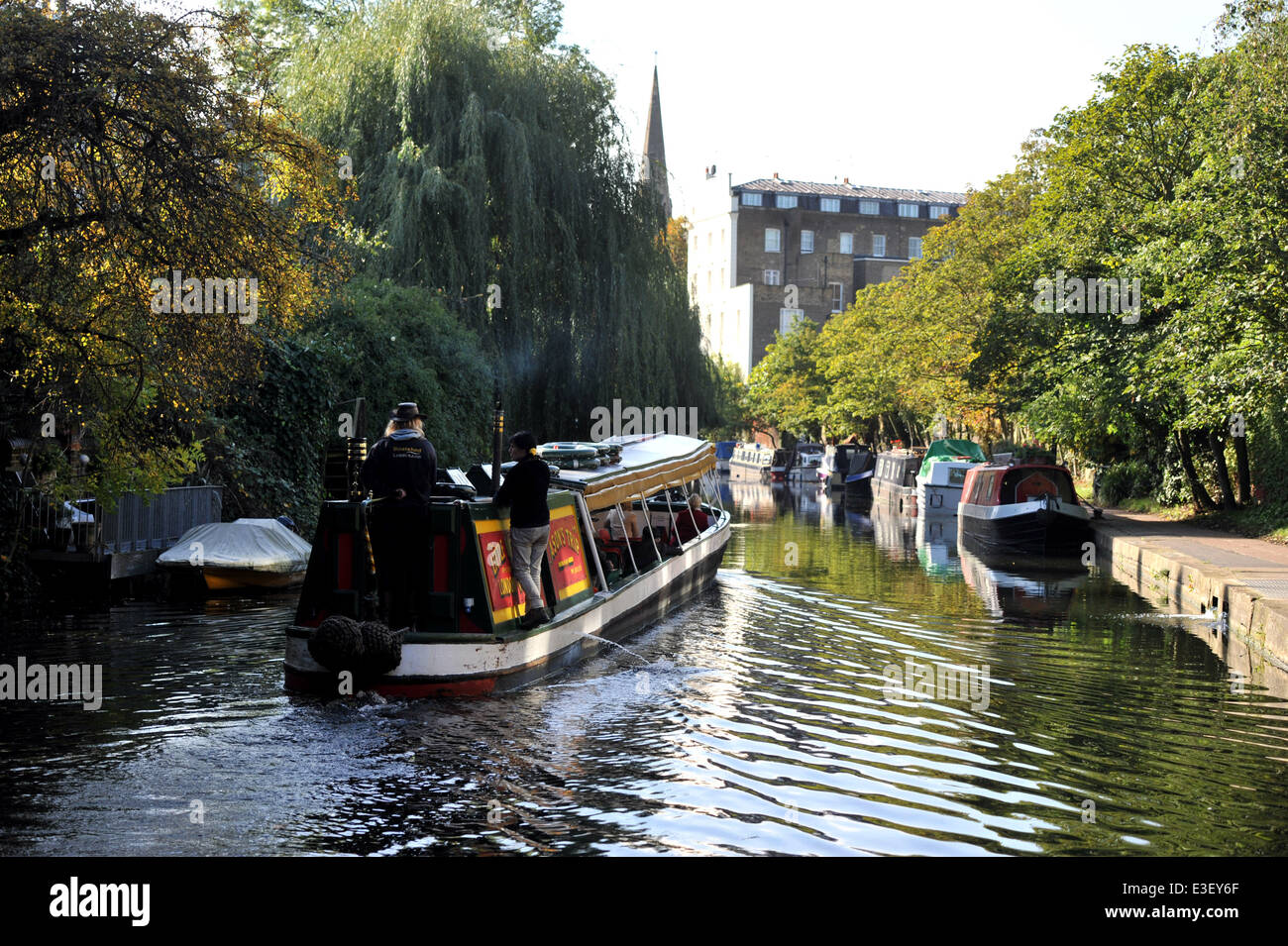 People enjoy the sunny autumn weather in London's Regent's Park and