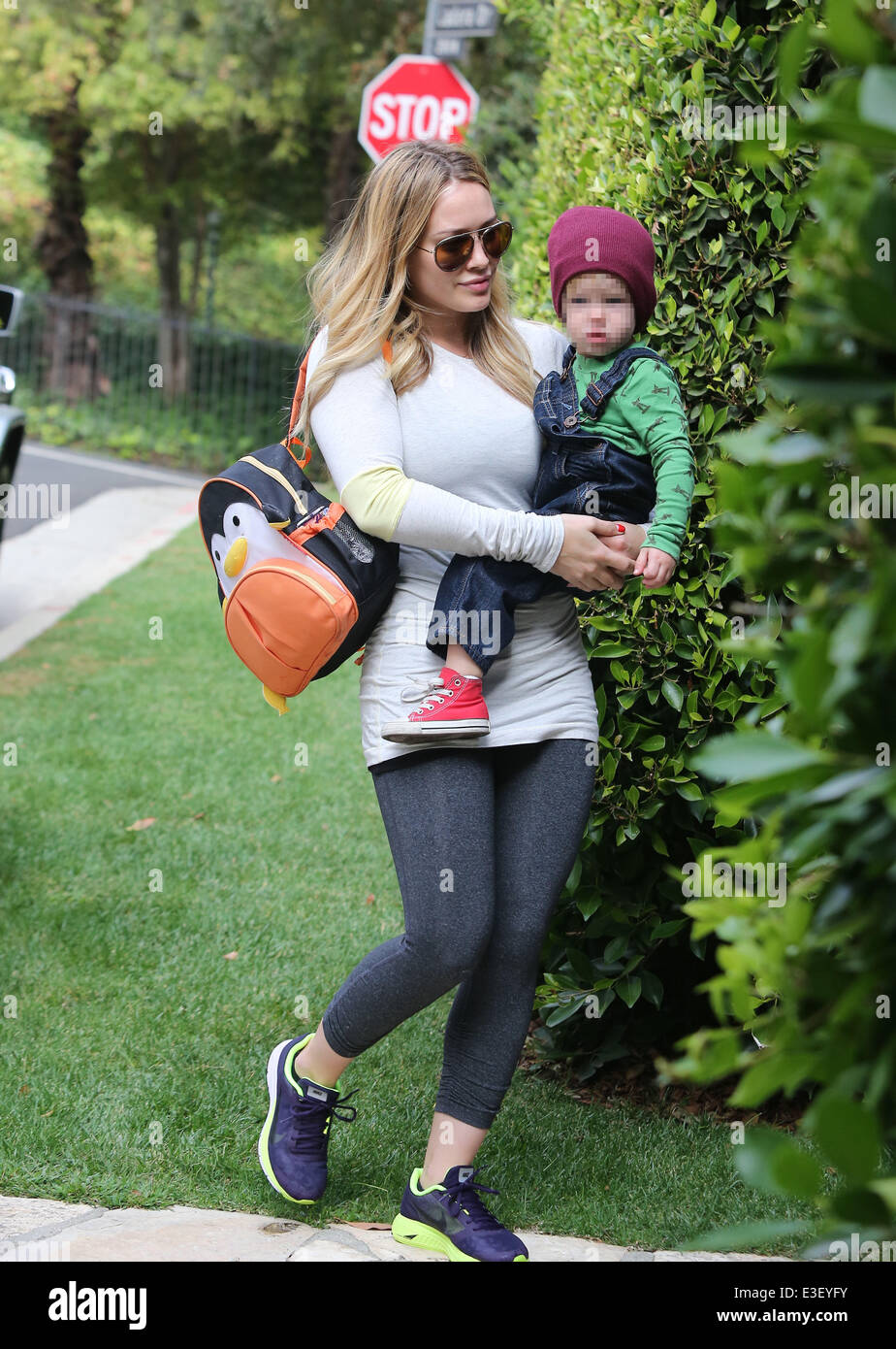 Hilary Duff out and about with son Luca in Beverly Hills  Featuring: Hilary Duff,Luca Where: Los Angeles,, CA, United States When: 24 Oct 2013 Stock Photo