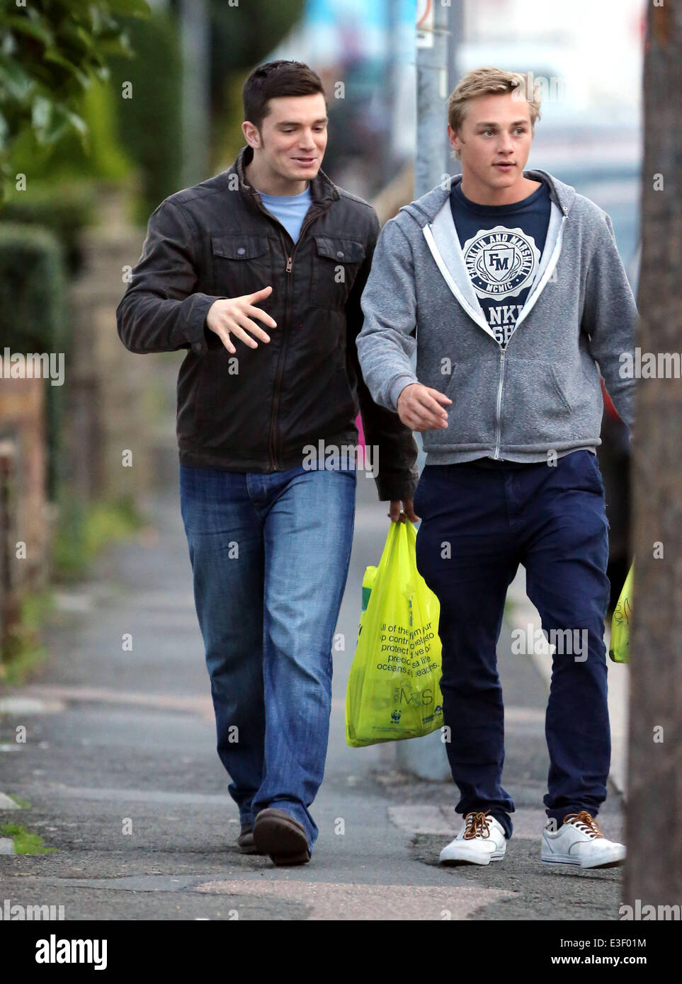 Eastender cast members, Ben Hardy and David Witts seen taking a break from filming at Elstree. David has been told he will be cut from the show.  Featuring: Ben Hardy,David Witts Where: London, United Kingdom When: 24 Oct 2013 Stock Photo