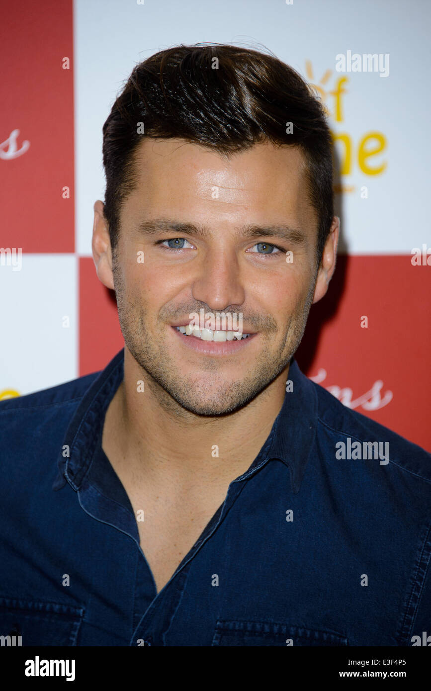 Mark Wright signs copies of his official 2014 calendar at Clintons in