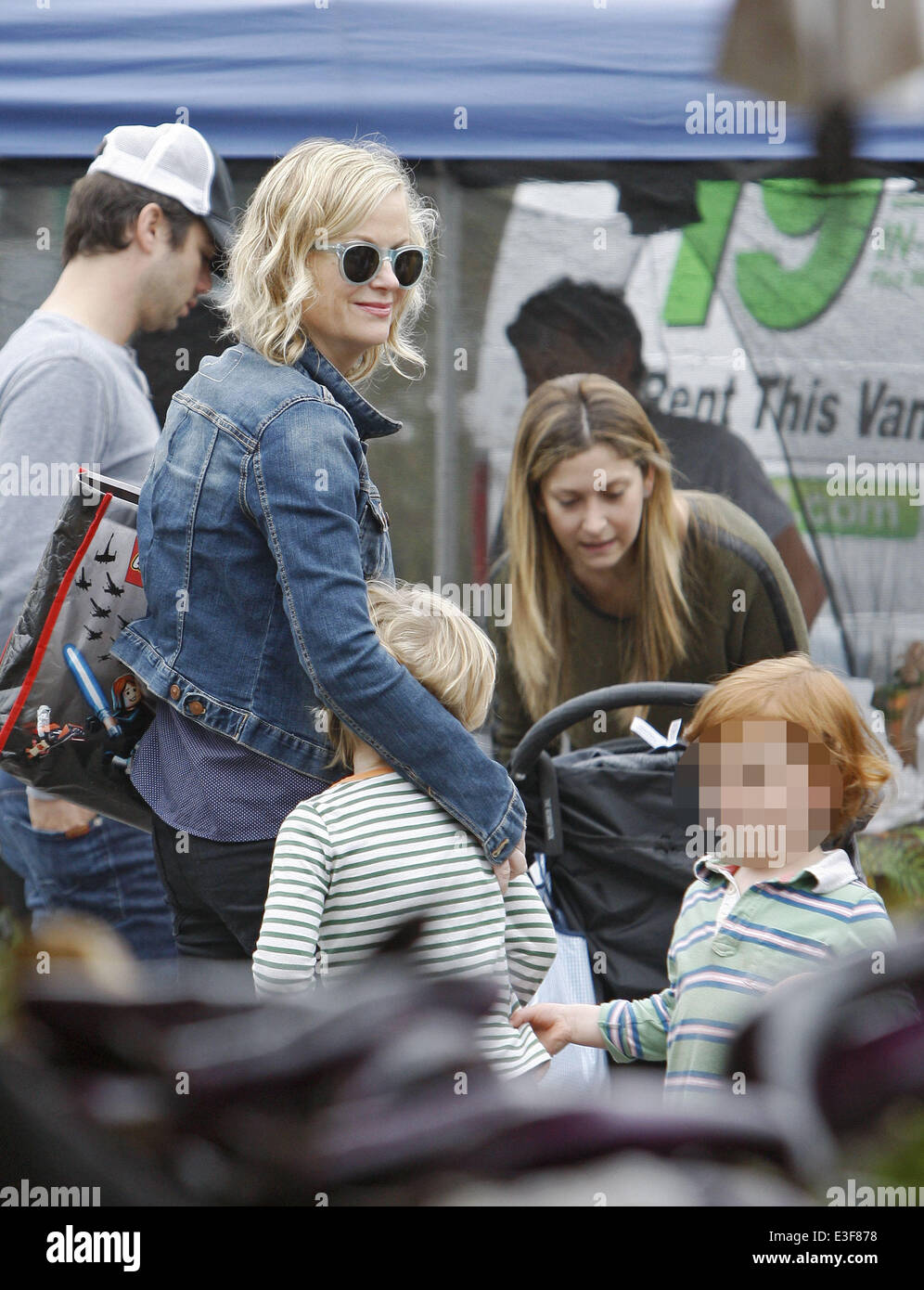 Amy Poehler out with her sons at the Farmers Market in Beverly Hills