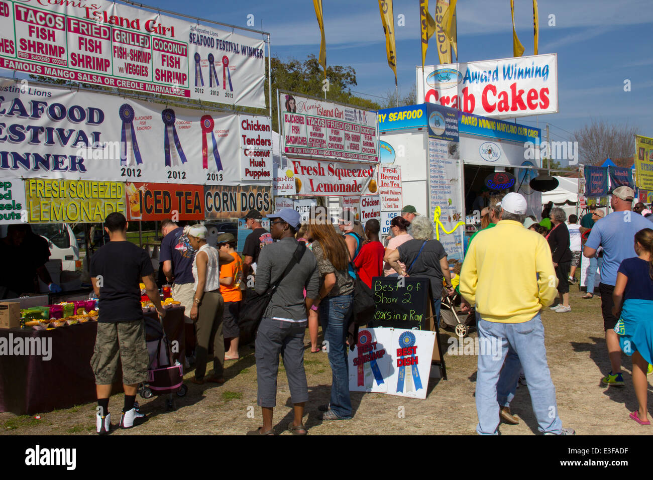 Hungry visitors throng vendor stalls at the annual St. Augustine Lions Seafood Festival, St. Augustine, FL Stock Photo