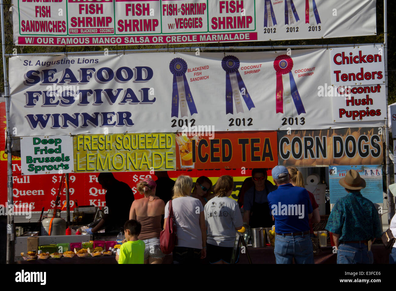 Hungry visitors throng vendor stalls at the annual St. Augustine Lions Seafood Festival, St. Augustine, FL Stock Photo