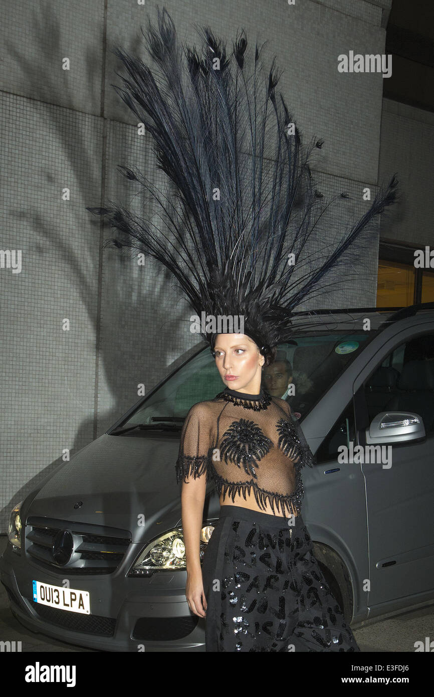 Lady Gaga leaves the ITV studios wearing a large black feathered head dress after appearing on the Graeme Norton show  Featuring: Lady Gaga Where: London, United Kingdom When: 29 Oct 2013 Stock Photo