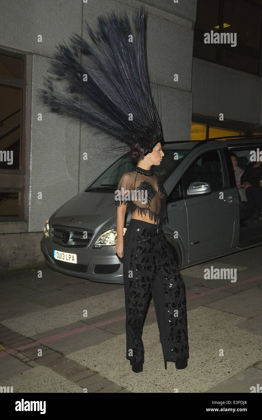 Lady Gaga leaves the ITV studios wearing a large black feathered head dress after appearing on the Graeme Norton show  Featuring: Lady Gaga Where: London, United Kingdom When: 29 Oct 2013 Stock Photo