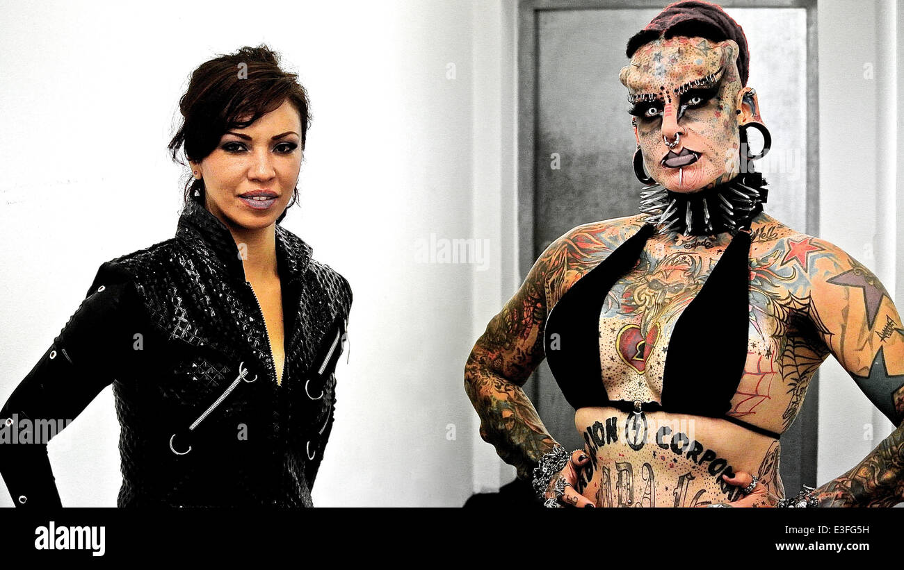 Maria Cristerna -  Vampire Lady in Vienna    . . . Maria Cristerna ‘The Mexican Vampire Lady’ has been referred to as a living, breathing canvas of modern body art and extreme modification. The 35-year-old ex-lawyer-turned-music-VJ from Guadalajara, Mexico, is covered head-to-toe in tattoos, with titanium horns inserted into her skull and a body-builder frame augmenting this striking visual image. Maria still lives in the same family home in which she grew up, in the heart of one of the most notorious ghetto neighbourhoods - with violent gang culture rife. She also endured many years of domest Stock Photo
