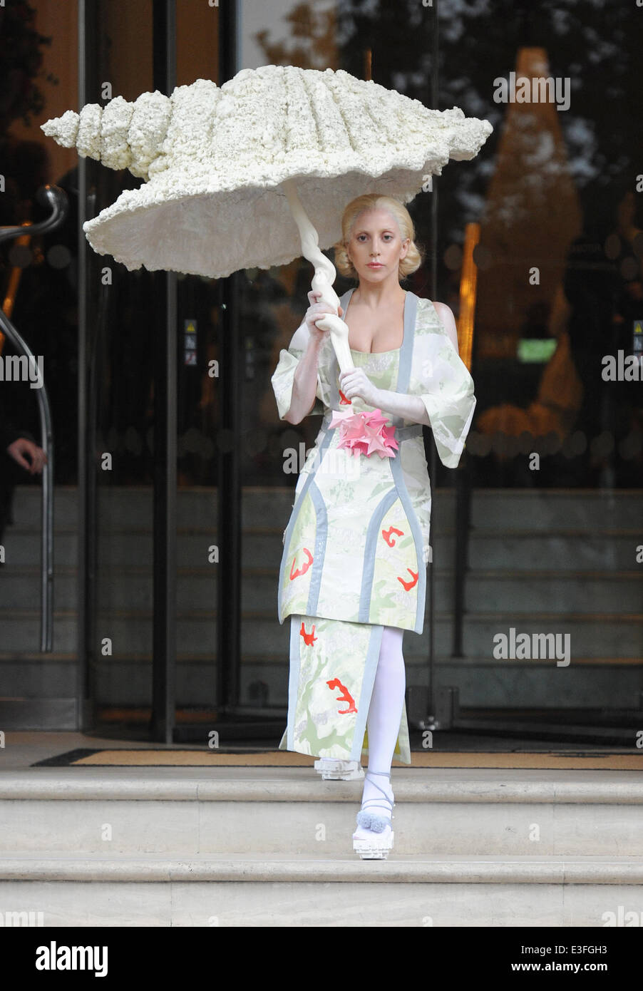 lady gaga shell dress leaves her hotel dressed in traditional Japanese Geisha attire while carrying an umbrella in the shape of a Featuring: Lady Gaga Where: London, United Kingdom When: 31 Oct 2013 lady gaga iconic outfits