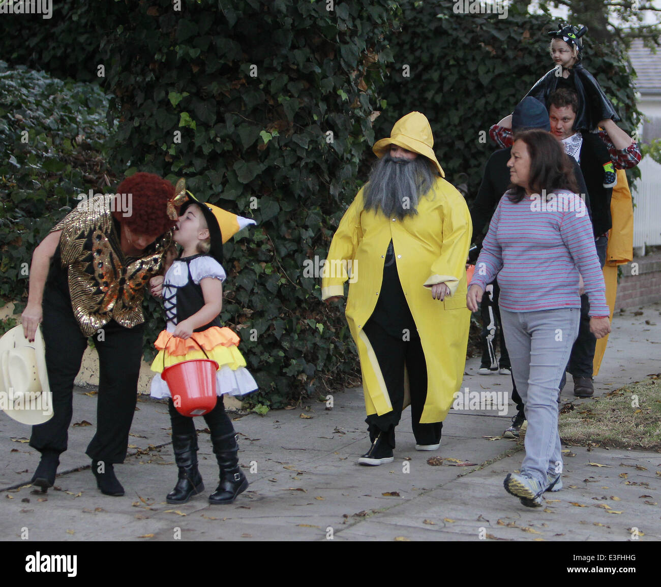 Sandra Bullock and Melissa Mccarthy dressed as a fisherman, complete