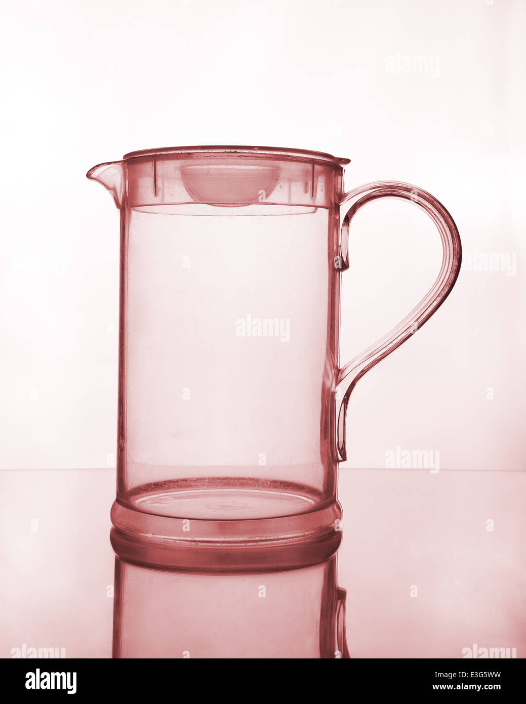 empty glass jug on glass table Stock Photo Alamy