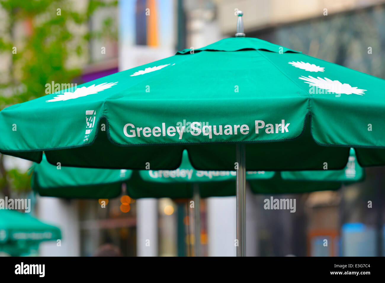 Greeley Square park, Umbrellas, Midtown Manhattan, New York Stock Photo