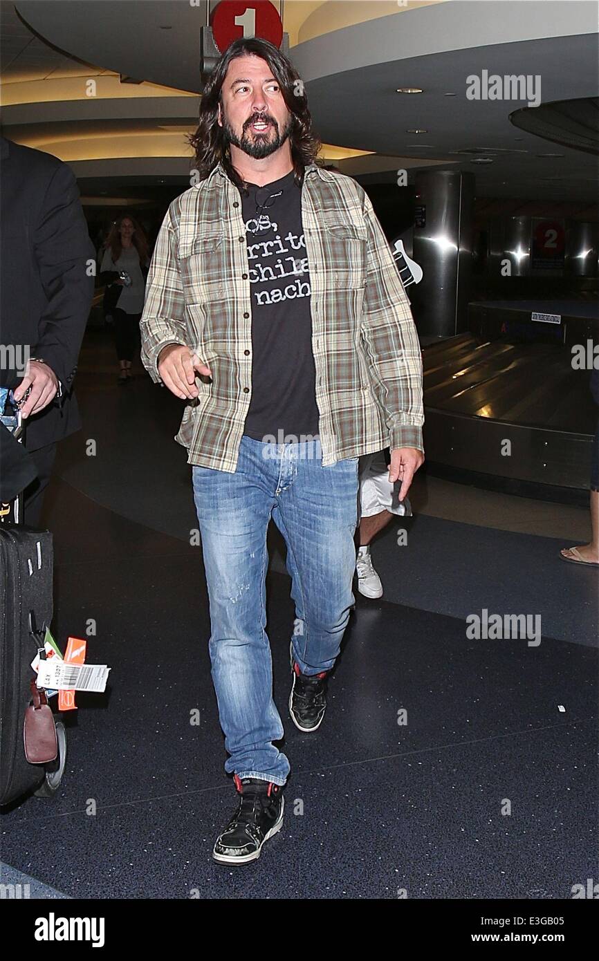 Dave Grohl enjoys being in Los Angeles after leaving LAX , with smiles and  attitude towards fans and photographers Featuring: Dave Grohl Where: Los  Angeles, California, United States When: 09 Nov 2013