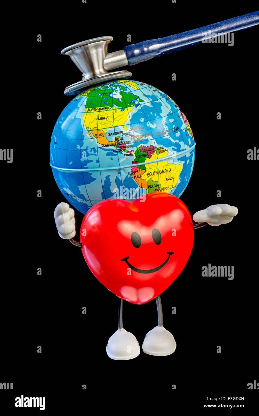Stethoscope on a toy of the globe with heart stress ball Stock Photo