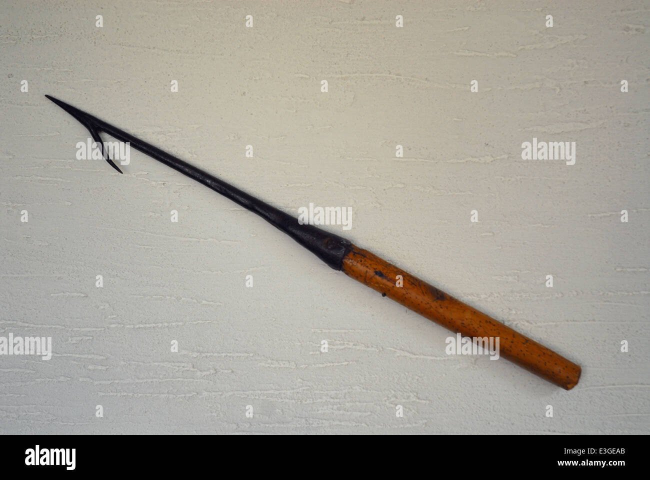spear end of a harpoon displayed on a wall Stock Photo - Alamy