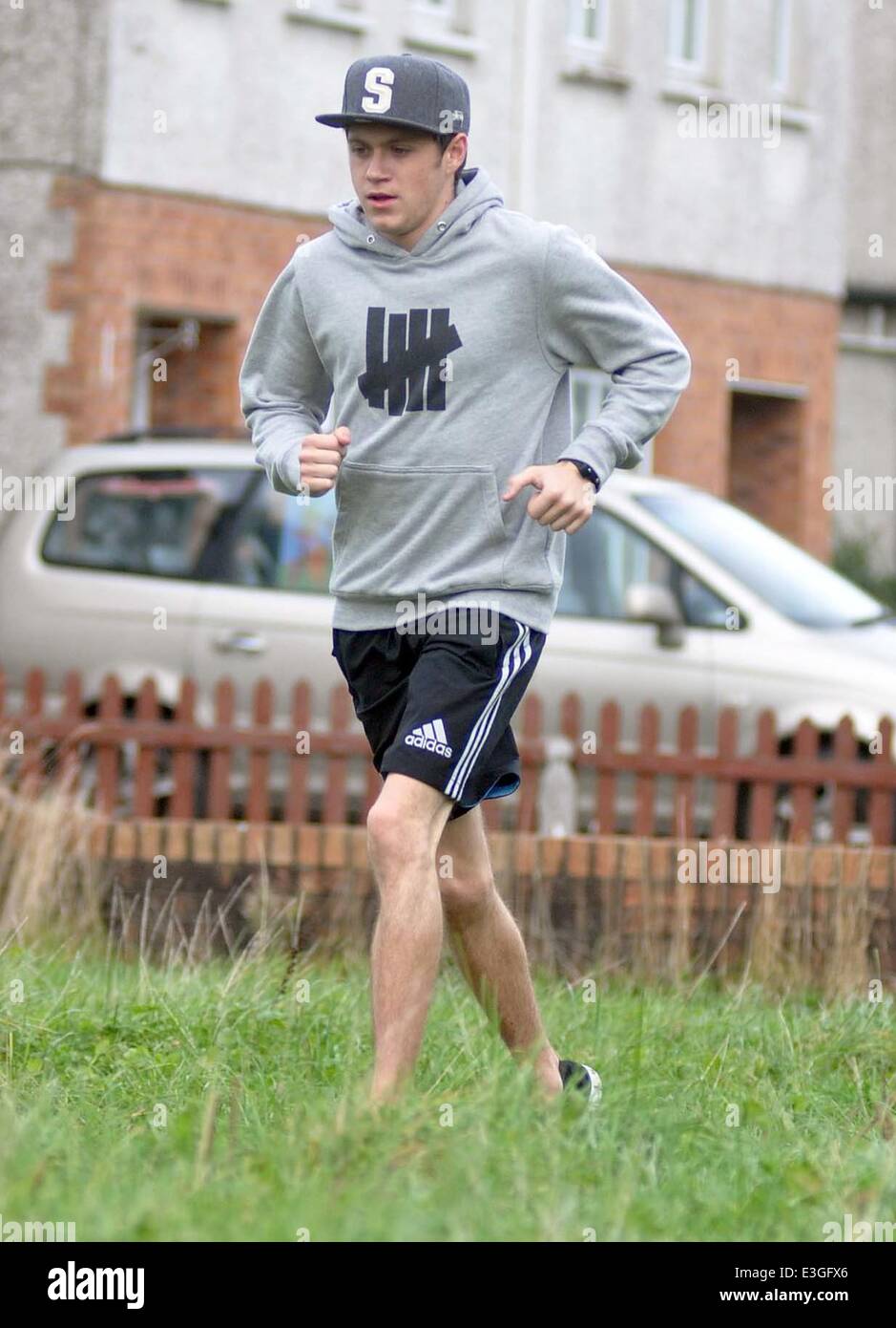 Niall Horan goes jogging near his home in Mullingar. On his return Niall  posed for photographs with fans waiting outside his house Featuring: Niall  Horan Where: Mullingar, Ireland When: 10 Nov 2013