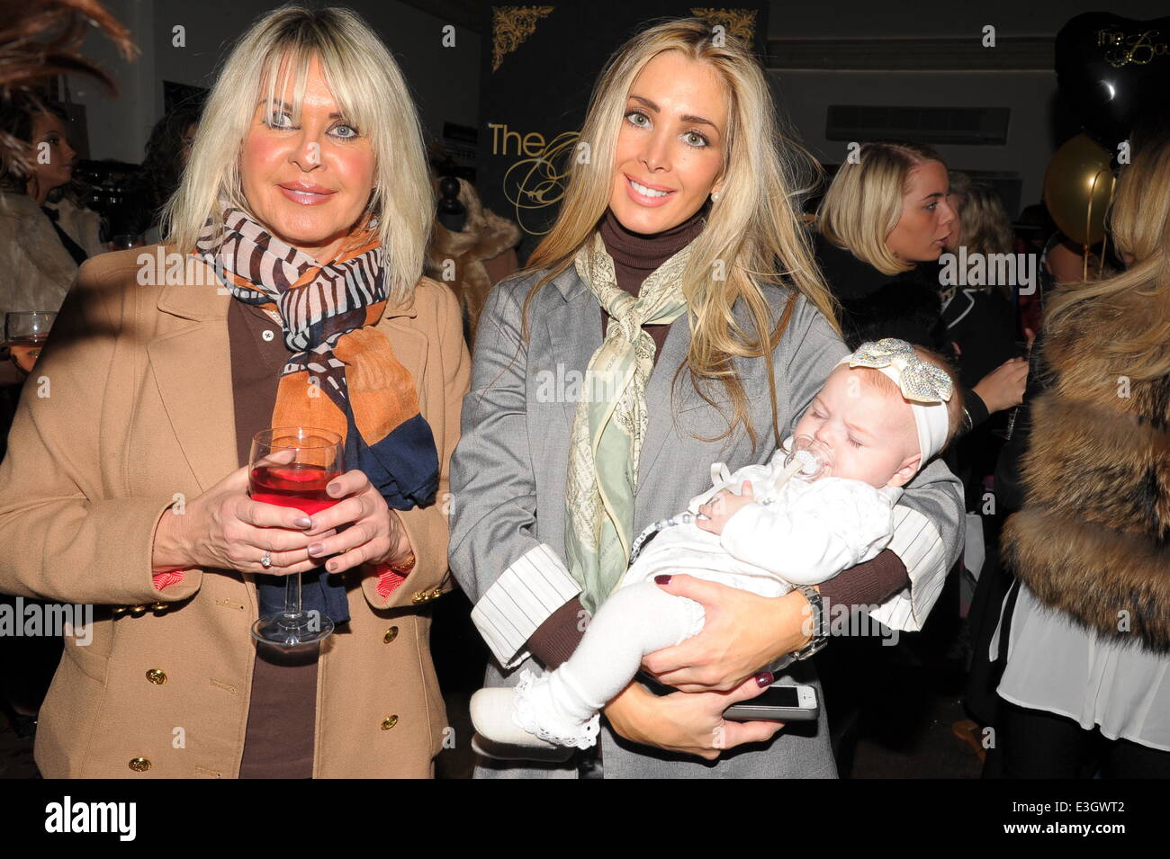 Celebrities and guests at The West Essex Fashion Fair  Featuring: Carter Milan Cohen(12 wks old),Caroline McKenzie,Jerri Lee Where: London, United Kingdom When: 13 Nov 2013 Stock Photo
