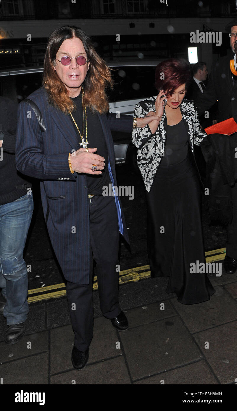 X Factor judges arriving at C London restaurant in Mayfair along with their partners for their aftershow dinner. Sharon Osbourne was seen arriving hand in hand with Ozzy Osbourne who this week announced they are back together. Gary Barlow also arrived wit Stock Photo