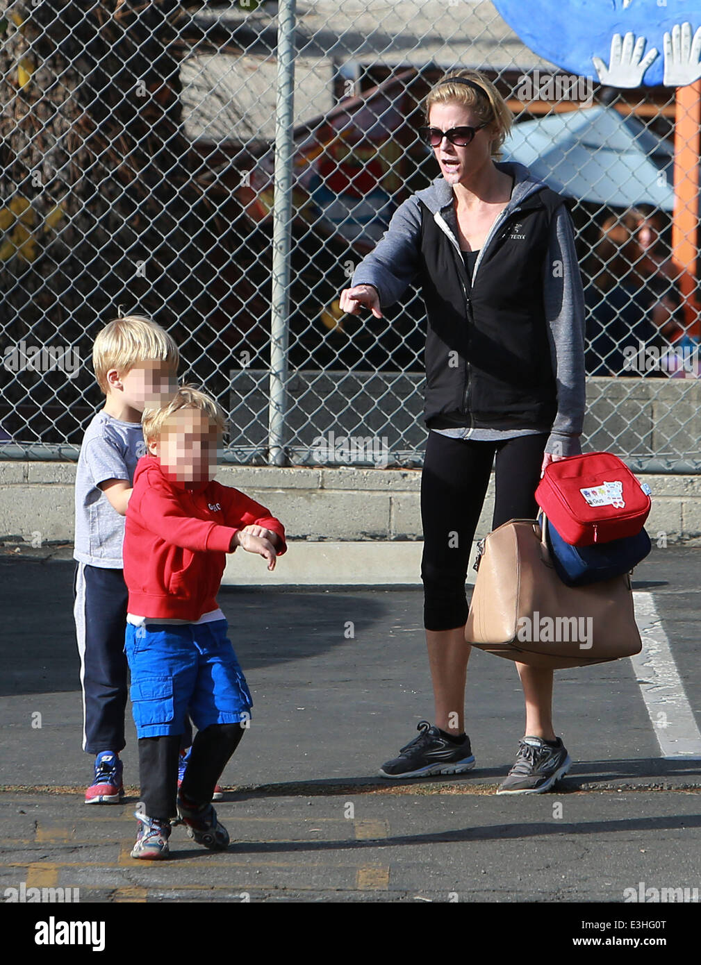 Julie Bowen takes her twin boys John and Gus Phillips to school
