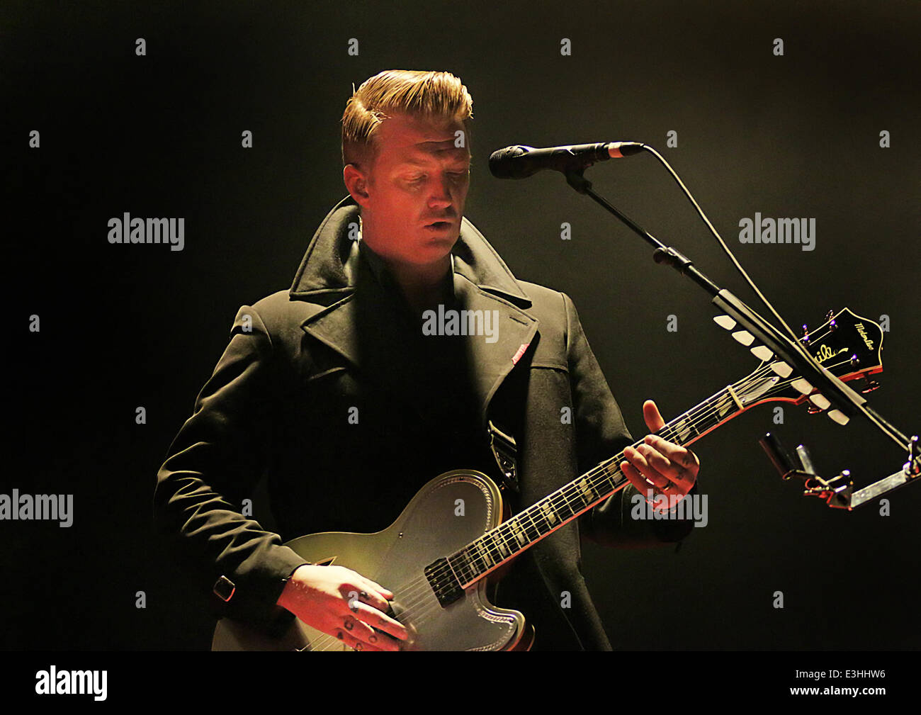 Queens of the Stone Age performing