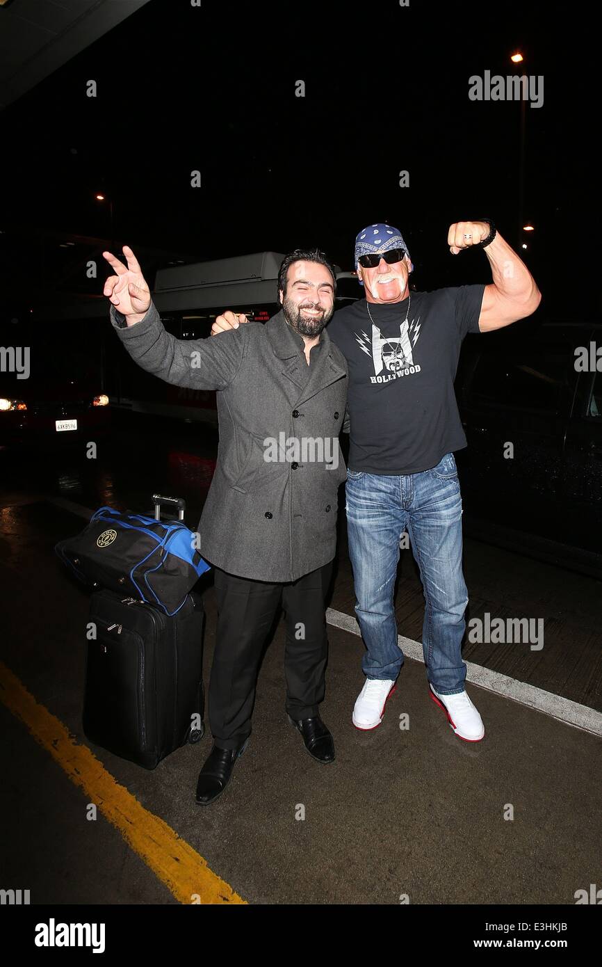 Hulk Hogan aka Terry Bollea poses for a photo with a fan at Los Angeles International airport  Featuring: Hulk Hogan,Terry Bollea Where: Los Angeles, California, United States When: 20 Nov 2013 Stock Photo