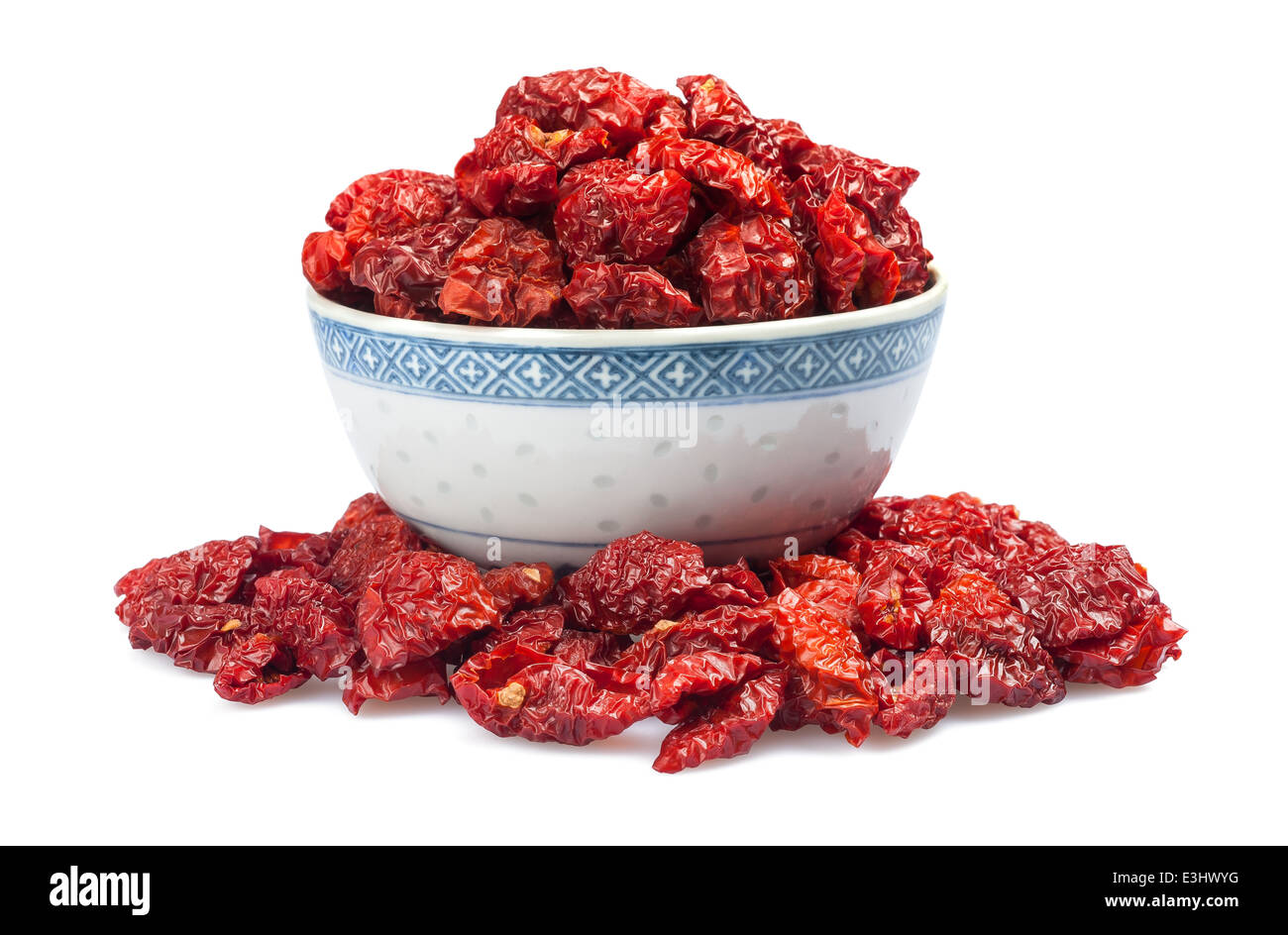 Dried tomatoes in a cup isolated on white background. Stock Photo