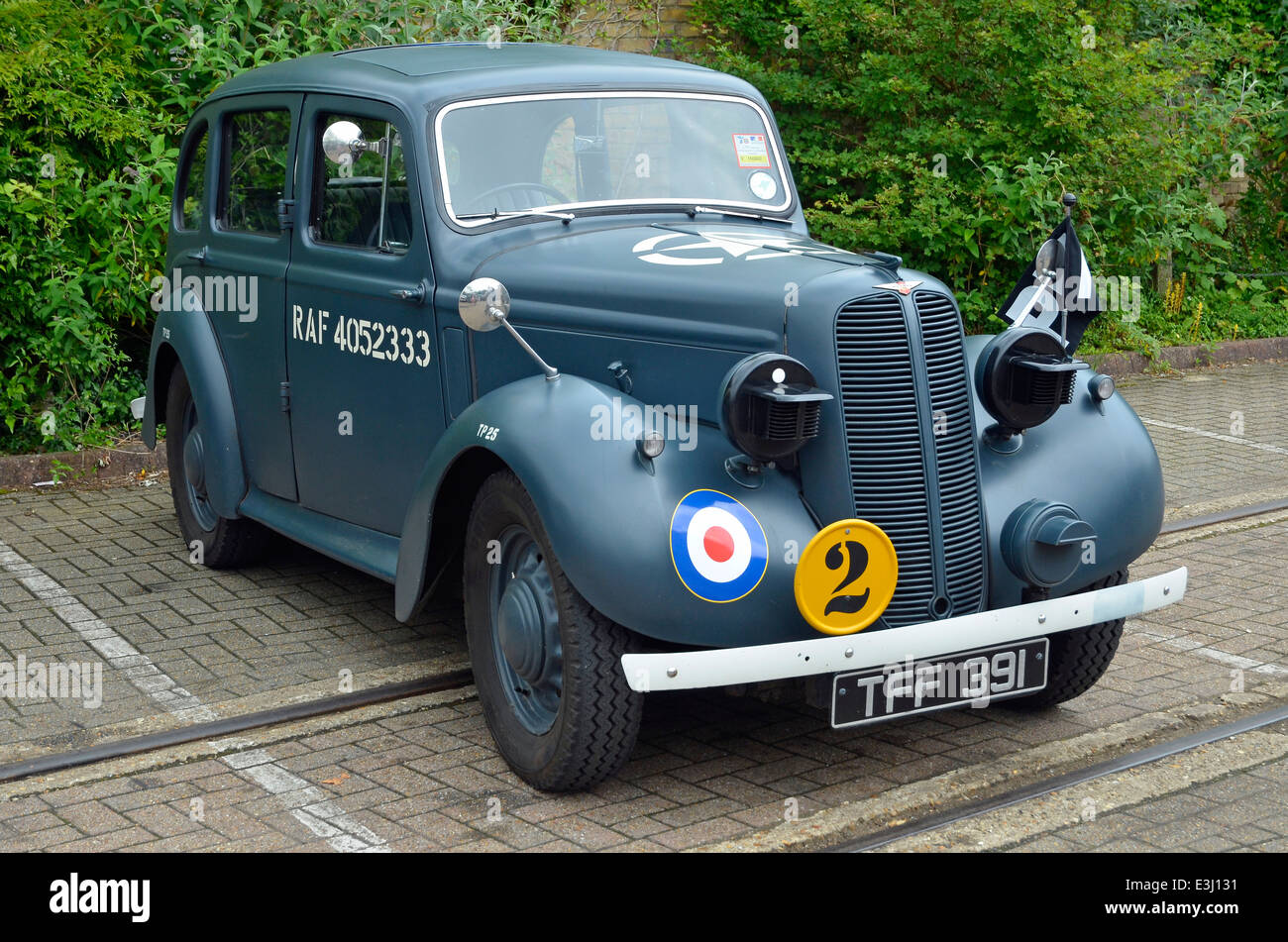 A 1939 Hillman Minx RAF Staff Car (TFF 391) showing insignia and shrouded headlights - in superb restored condition. Stock Photo