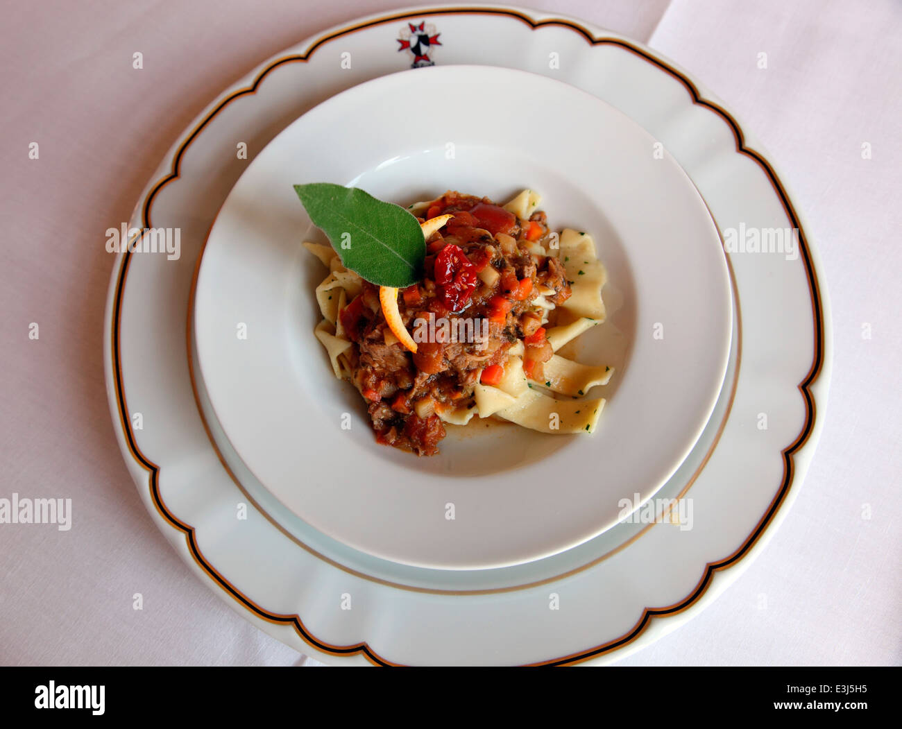Tagliatelle with goat ragout cooked by Chef Giorgio Ruggeri at Hotel Eremo Della Giubiliana Stock Photo