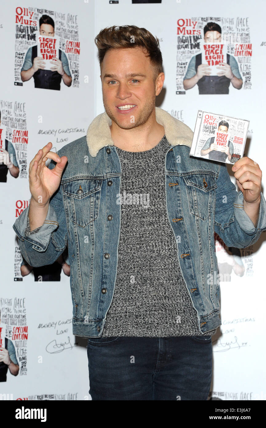 Olly Murs meets fans at HMV Oxford Street to promote the release of his  single 'Hand On Heart' off his album 'Right Place Right Time' Featuring: Olly  Murs Where: London, England, United