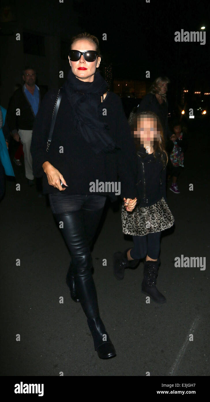 Heidi Klum dressed in tight black leather trousers and boots leaves Mr Chow  in Beverly Hills with family Featuring: Heidi Klum,Leni Samuel Where: Los  Angeles, California, United States When: 01 Dec 2013