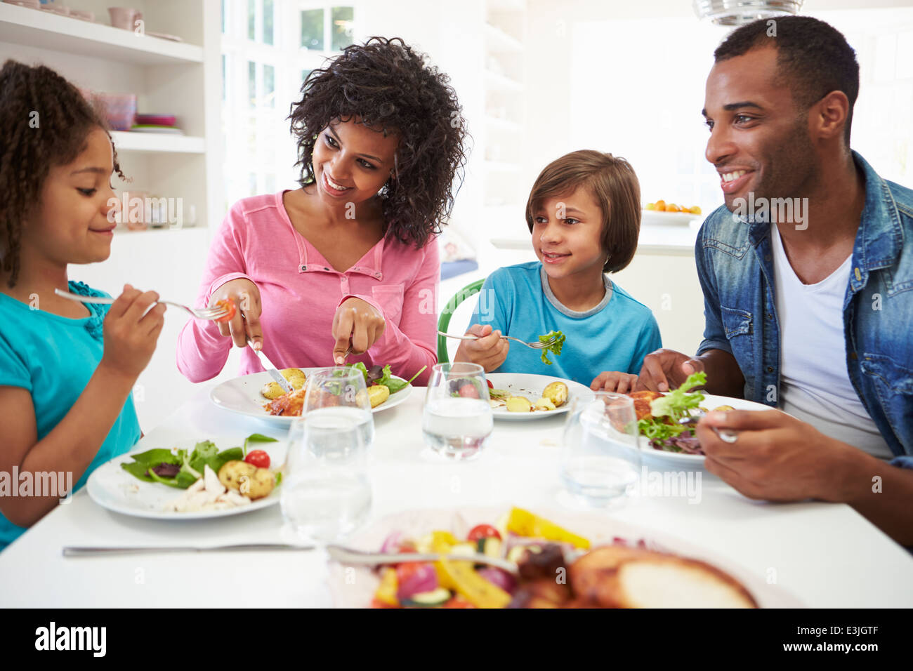 Happy Black Family Eating