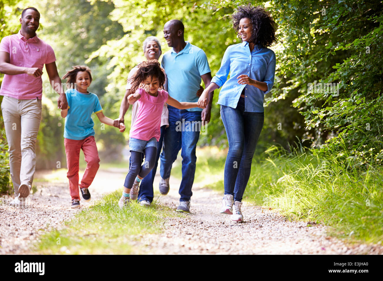 Multi Generation African American Family On Country Walk Stock Photo