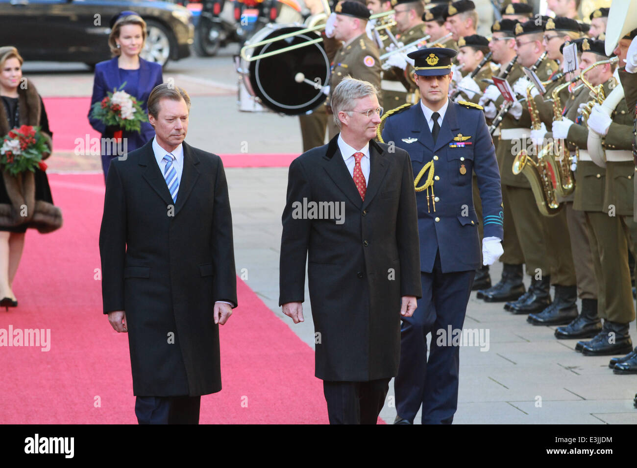 The Belgian royals attend a welcome ceremony hosted by Grand Duke Henri and Grand Duchess Maria Teresa of Luxembourg at Grand Ducal Palace in Luxembourg City. King Philippe and Queen Mathilde of Belgium, accompanied by Belgian Prime Minister Elio Di Rupo Stock Photo