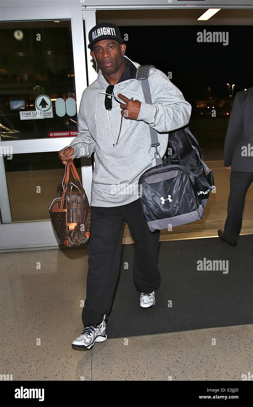 Deion Sanders is all smiles as he leaves LAX for his trip Featuring Deion Sanders Where Los