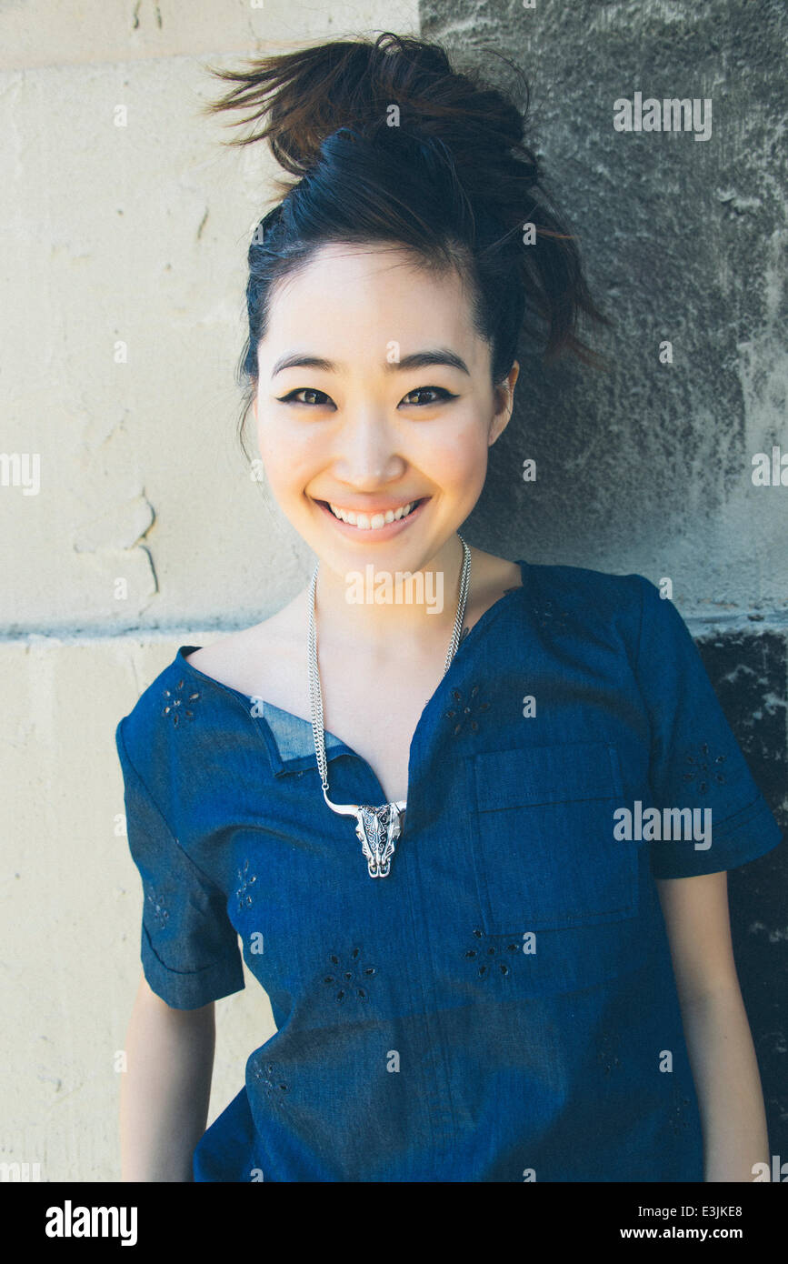 Asian woman smiling hi-res stock photography and images - Alamy