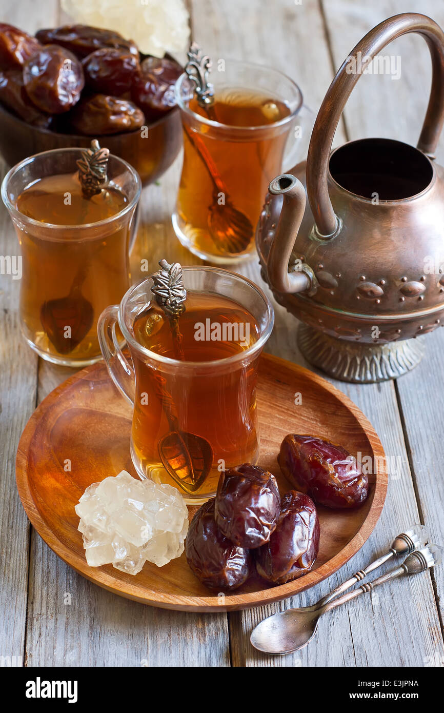 Traditional arabic tea with dry madjool dates and rock sugar nabot
