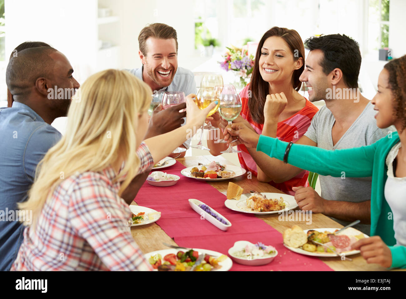 Young female making dinner hi res stock photography and images Alamy