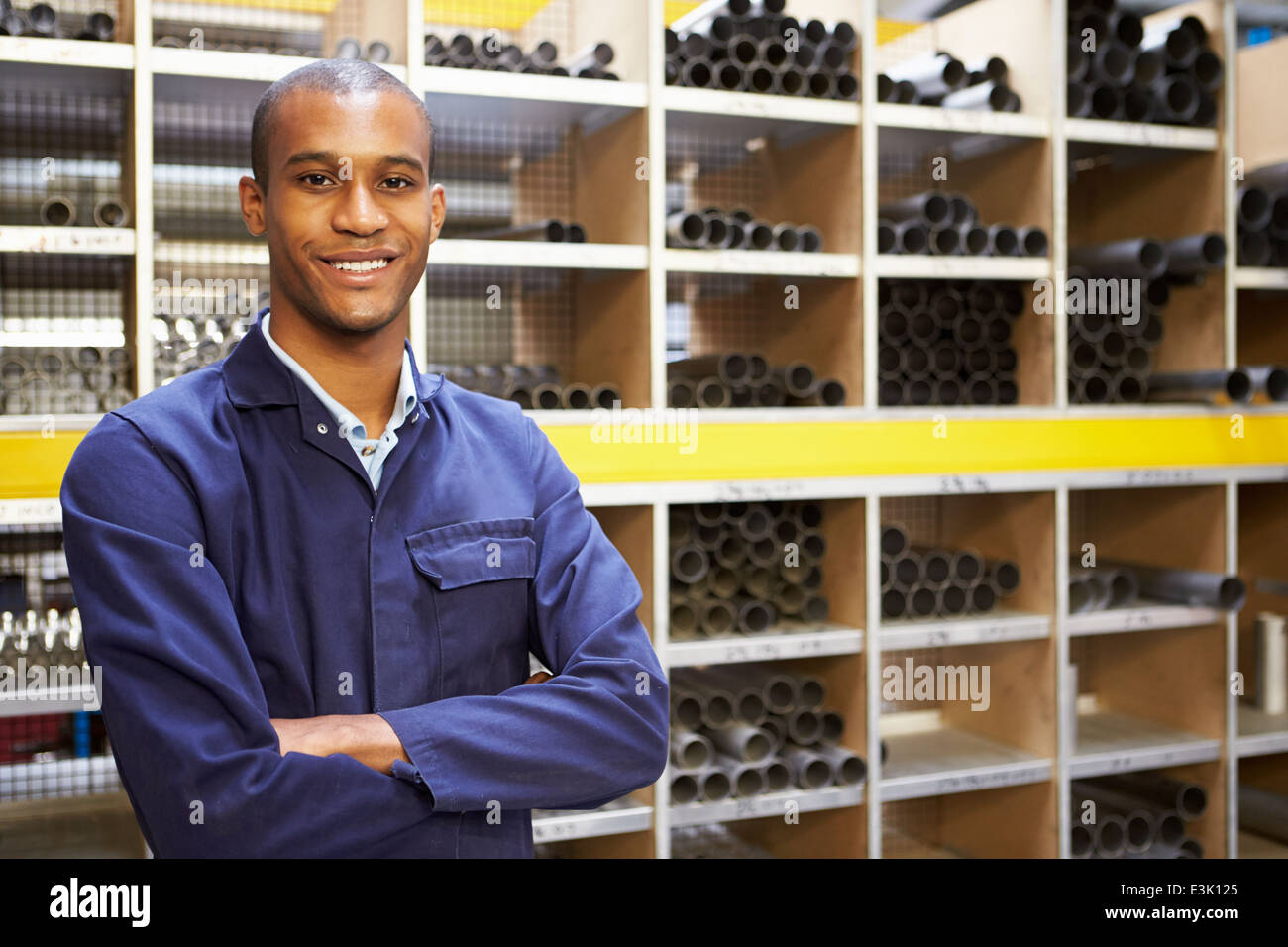 Portrait Of Engineering Worker In Store Room Stock Photo