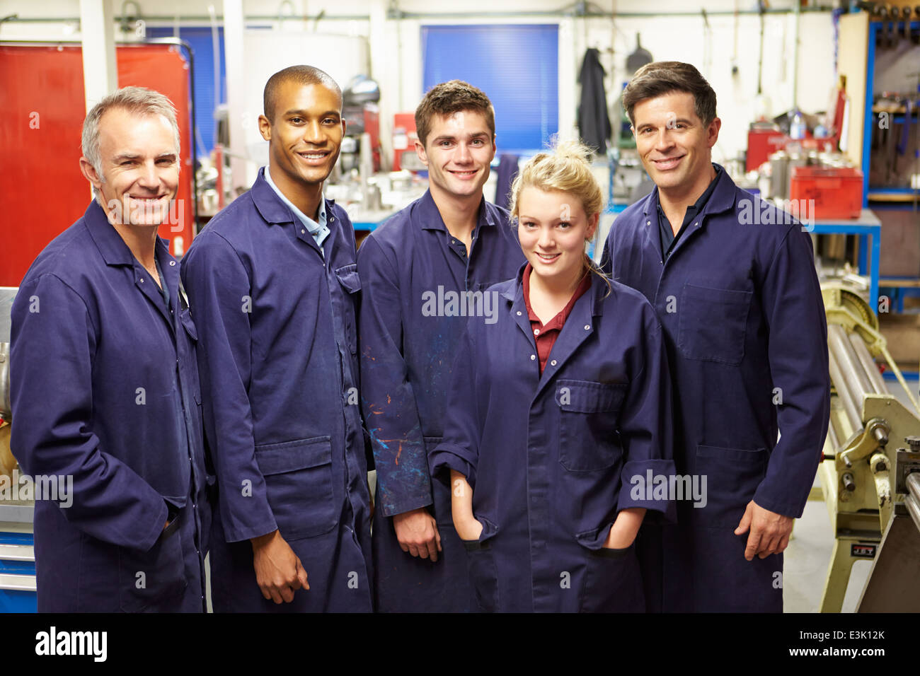 Portrait Of Staff Standing In Engineering Factory Stock Photo
