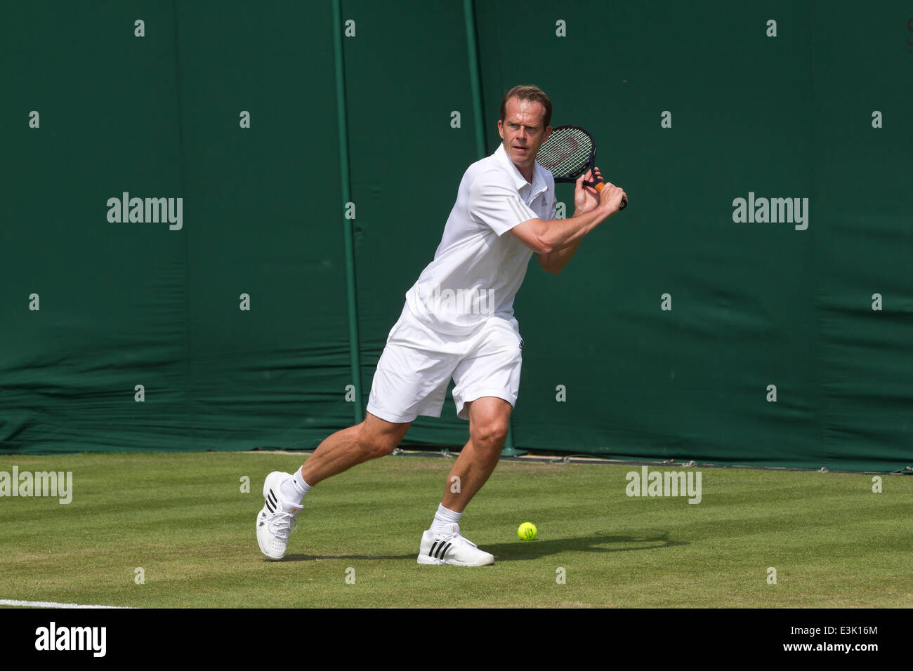 Wimbledon, London, UK. 24th June, 2014.  Picture shows Stefan Edberg former Wimbledon Chamion and now appointed coach for Roger Federer (SUI) warming up on day two of Wimbledon Tennis Campionships 2014. Credit:  Clickpics/Alamy Live News Stock Photo
